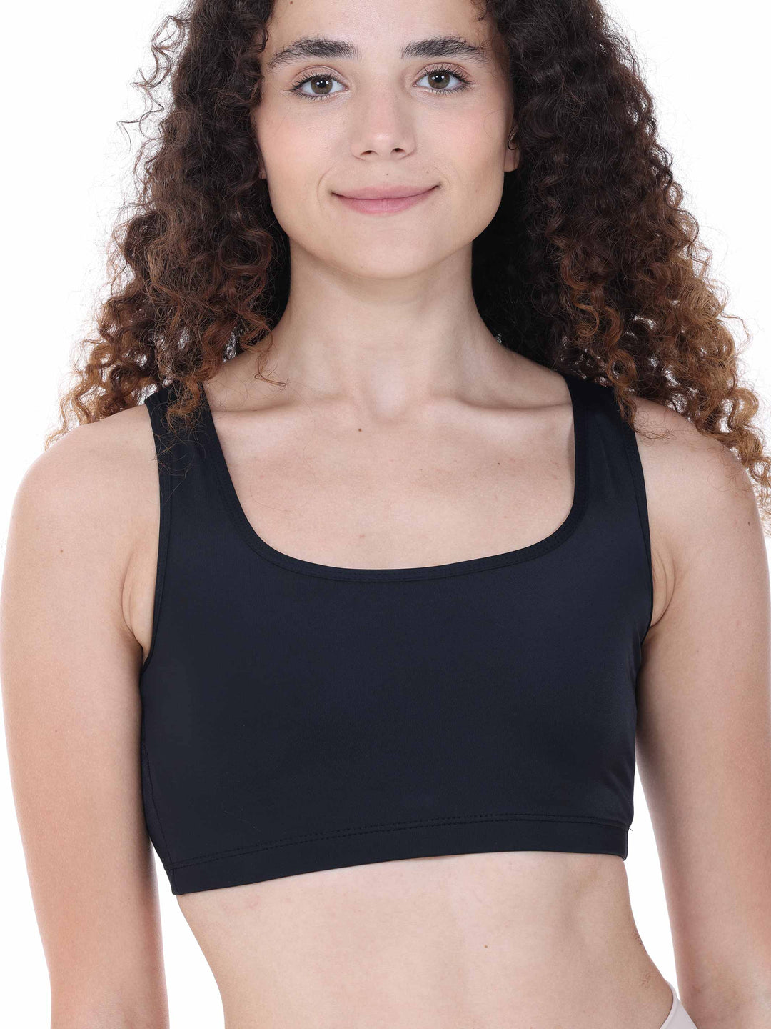 Vue rapprochée d’un top de danse noir à bretelles larges – brassière stretch pour pratique de danse.