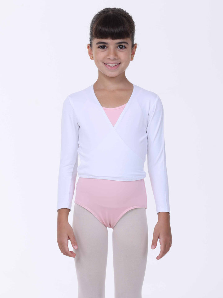 Cache-cœur de ballet blanc – haut de danse fille porté sur justaucorps rose clair.