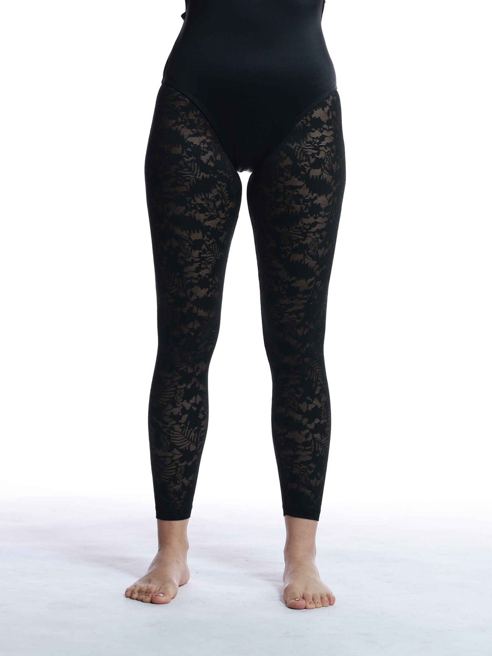 Détail du motif floral en dentelle des collants pour femme - design raffiné