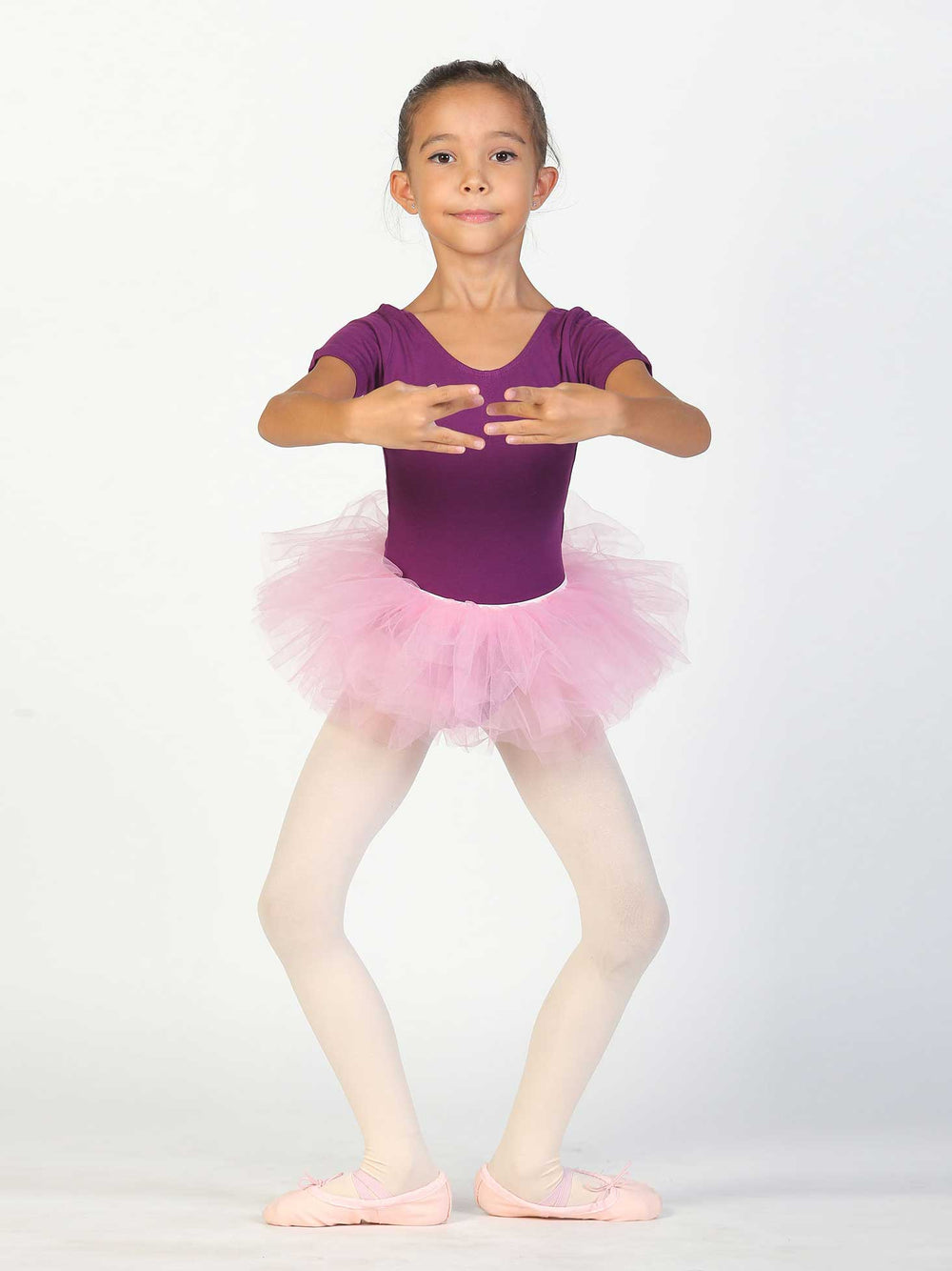 Tutu de danse classique pour enfant – jupe rose clair en tulle, tenue de ballet élégante.
