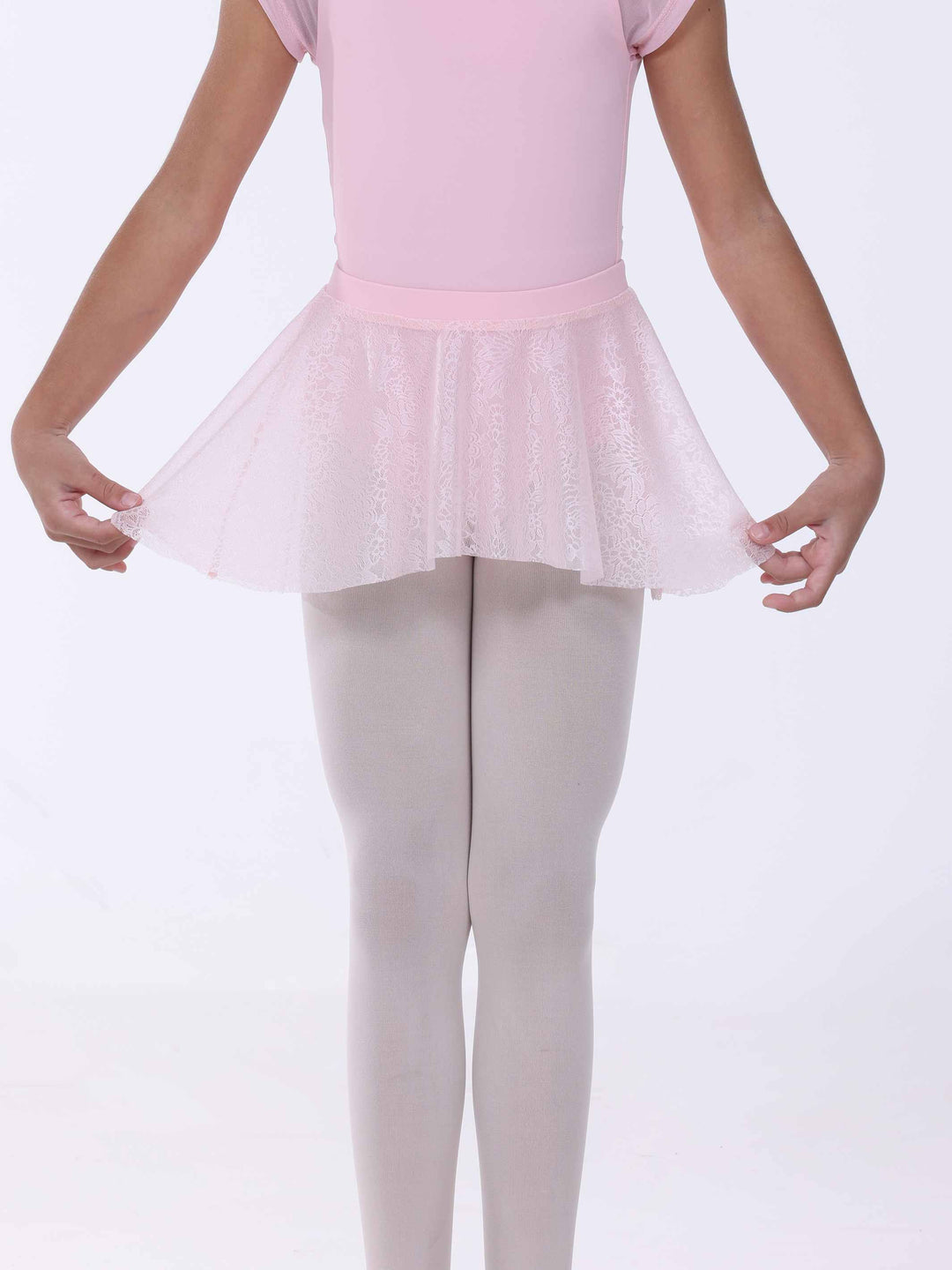 Vue de dos d’une jupe de danse rose clair en dentelle florale – tissu léger et ceinture élastique.