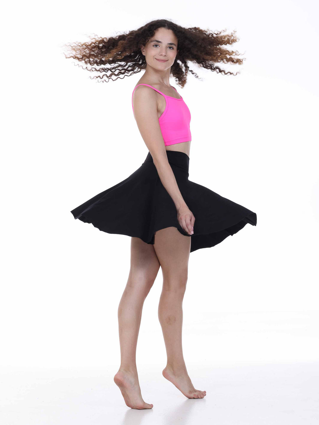 Jupe noire de danse contemporaine – design ample et tissu stretch avec short intégré.
