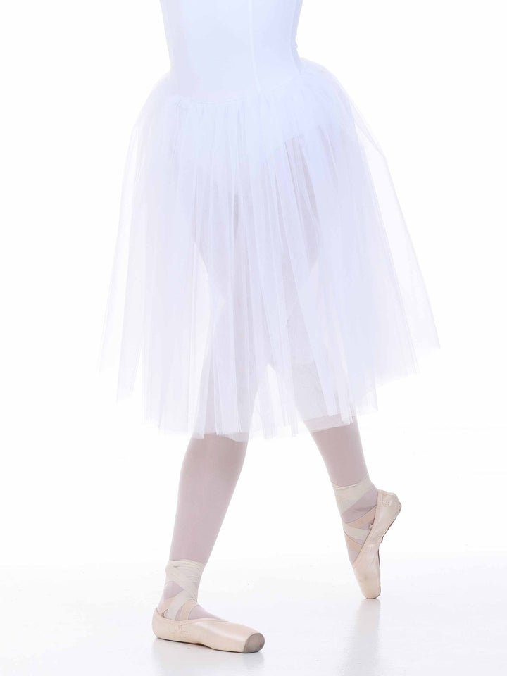Détail du tutu blanc longueur midi — jupe en tulle délicat et finition soignée.