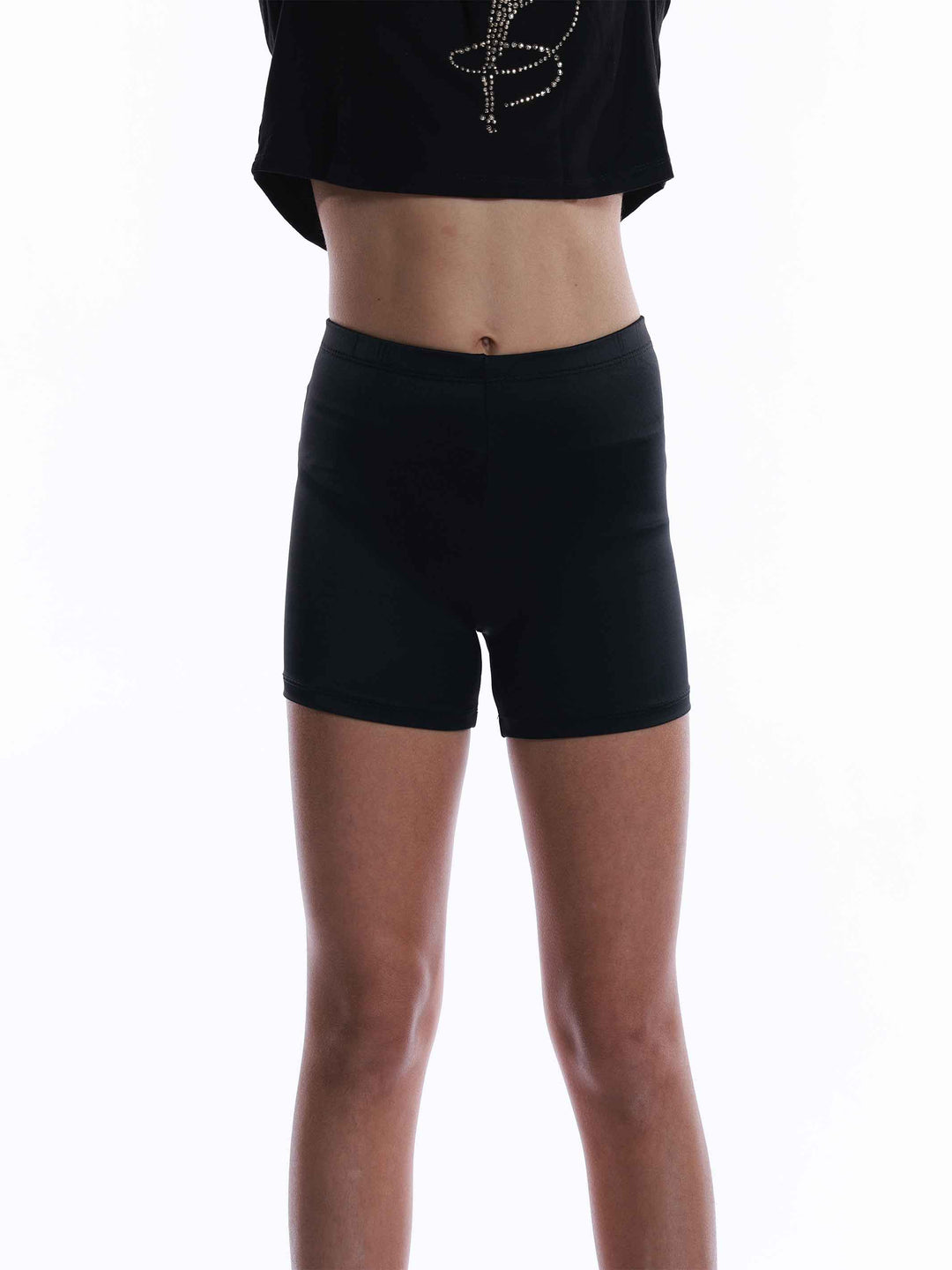 Short basique de danse et gymnastique pour fille, noir, avec forme culotte pour un ajustement confortable. Taille élastique de 2 cm pour un maintien parfait et coupe courte pour une liberté de mouvement optimale. Parfait pour les cours de danse, la gymnastique et autres activités sportives