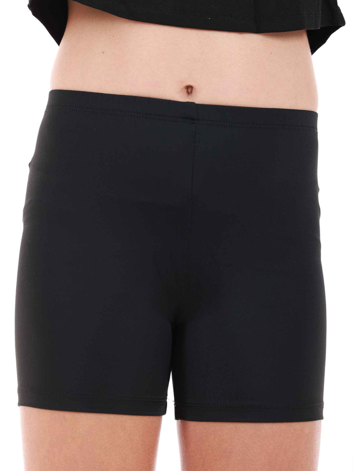 Short basique de danse et gymnastique pour fille, noir, avec forme culotte pour un ajustement confortable. Taille élastique de 2 cm pour un maintien parfait et coupe courte pour une liberté de mouvement optimale. Parfait pour les cours de danse, la gymnastique et autres activités sportives
